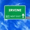 IRVINE road sign against clear blue sky