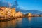 Ischia town waterfront on sunset, Italy