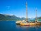 Isfjorden fjord and adjacent mountains and sailboat in Andalsnes, Norway