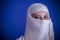 Islam, Beautiful arabic woman with traditional veil on her face,