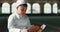 Islam, child in mosque reading Quran for learning, mindfulness and gratitude in faith with prayer. Worship, religion and
