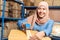 Islam Muslim warehouse worker packing goods cardboard box