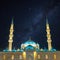 Islamic background image. Eminonu Yeni Cami or New Mosque with milky way.