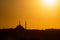 Islamic background photo. Silhouette of Fatih Mosque at sunset.