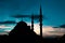 Islamic photo. Silhouette of Mosque at sunset with dramatic sky