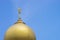 Islamic religion crescent moon sign on mosque with blue sky