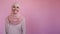 islamic woman portrait positive emotion hijab pink