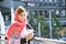 Islamic woman using smartphones app organize schedule agenda  focus on hands holding smartphone muslim modern uae city. Arab woman