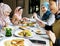 Islamic women friends dining together with happiness