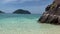 Island aerial view beach sand background. Travel landscape summer beautiful blue sky clouds moving fast. Nature abstract motion.