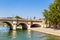 Island of the City. Quai des Orfevres. New bridge in Paris