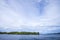 The island, the cloud and the blue sky, beautiful view of Iboih Beach, in Sabang, Indonesia