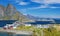 Island of Hamnoy, Lofoten Islands, Norway. Norwegian fishing village with  Fjord and Mountain In Background