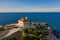 Island Host with lighthouse in Adriatic sea, Croatia