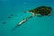 Island Ilha do Frances with boats and blue ocean in Florianopolis. Aerial drone view