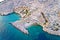 Island of Krk idyllic pebble beach with karst landscape aerial view, stone deserts of Stara Baska