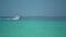 Island In Maldives - Boat Floating Over The Crystal Clear Sea Water With Coral Reef At The Bottom - A Beautiful Tourist