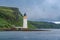 Island of Mull north cape green hills and Tobermory lighthouse