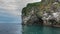 An island in the Pacific Ocean. Seabirds nest on steep rocky slopes