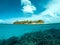 Island reef coral blue sky tree sand green clouds underwater gopro fish ocean crystalclear