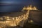 The island of RÃ¼gen in Germany, Sellin`s famous beach with the illuminated pier in the evening.