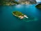 The island of San Paolo Isola di San Paolo in Iseo lake in Italy. Beautiful summer landscape with alps and blue lake