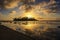 island at sunrise on muri beach in cook islands on rarotonga