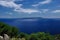 Island view with forest ship clouds and sky, Giglio, Tuscany, Italy