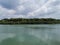 Island of wetland trees on amazing color of river water in Kuala Sedili Besar, Johor, Malaysia.