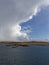 The isle of Bressay and Bressay Sound with a dramatic weather front moving in over the Islands.