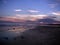 Isle of palms South Carolina sunset through the clouds with purple skies