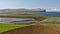 Isle of Skye, Scotland - View across Ardmore point towards distant Dunvegan Head with towering sea cliffs and the deep blue ocean