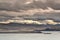 Isle of Skye in Scotland - view on Cuillin Hills covered in December snow and exposed to sunset light