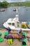 ISLE OF SKYE, UK - JUNE 18, 2017: Fishermen unloading a catch of crabs at Portree harbor, Highlands, Scotland