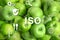 ISO 22000 - Food safety management. Fresh apples as background