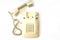 Isolate beige old telephone with wire tube lies on white background