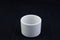 Isolate blank white mini cramic cup on black background.