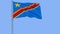 Isolate flag of Democratic Republic of the Congo on a flagpole fluttering in the wind on a blue background, 3d rendering.