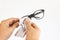 Isolate hands scrub or cleaning eyeglasses on white background