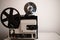 Isolated 8mm projector. Antique video technology. Old retro machine for films. Space for text