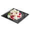 Isolated airy pavlov dessert with red berries