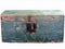 Isolated antique wooden tongue in groove chest or toolbox painted green with lock