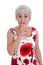 Isolated attractive mature woman making silence or attention gesture with her finger.