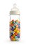 Isolated baby bottle containing colorful dice