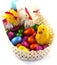 An isolated basket with Easter eggs and chickens