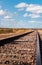 Isolated Beauty: Sunlit Train Tracks in Guajira\\\'s Desert Landscape