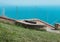 Isolated bench in a park above the Mediterranean sea Marche, Italy