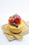 Isolated berries cheesecake on wood cutting board, berries sweet