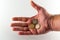 Isolated big hand with euro coins