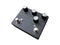 Isolated black boutique vintage Overdrive stomp box effect for electric guitar on white background.